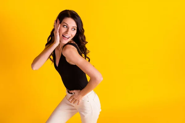 Foto de menina alegre feliz sorriso positivo olhar espaço vazio lindo fantasia isolada sobre fundo de cor amarela — Fotografia de Stock