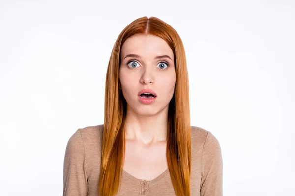 Photo of charming excited redhair woman beige shirt big eyes open mouth isolated white color background — Stock fotografie
