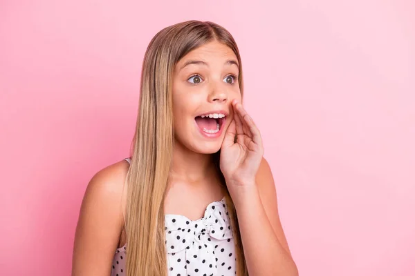 Portrait of sweet blond girl hand mouth tell look empty space wear white cloth isolated on pastel pink color background — Stock Photo, Image