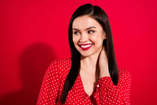 Photo of millennial flirty brunette lady touch body look empty space wear red dress isolated on vivid color background — Stock Photo, Image