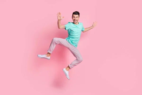 Full body photo of young man happy positive smile have fun jump up isolated over pastel color background — Stock Photo, Image