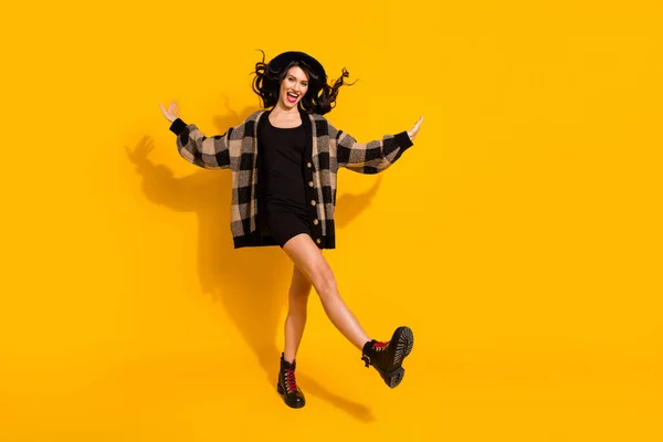 Photo of active lady dance go wear headwear checkered jacket short dress shoes isolated yellow color background