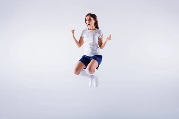 Full length body size view of her she nice-looking attractive pretty slim satisfied straight-haired girl jumping rejoicing having fun final isolated over light white gray pastel color background — Stock Photo, Image