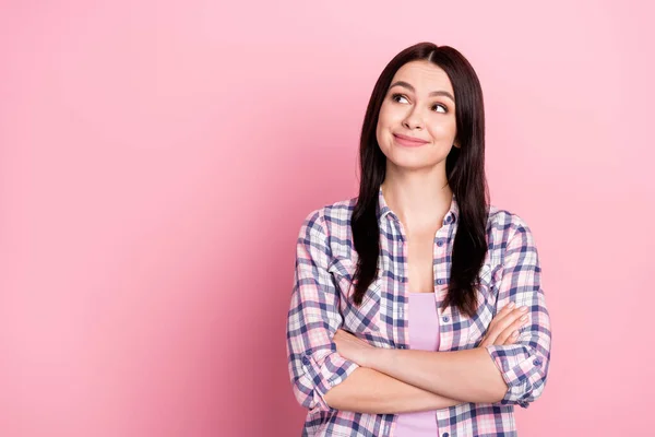 Photo of cute charming young woman wear plaid shirt smiling arms crossed looking empty space isolated pink color background — Stock Photo, Image