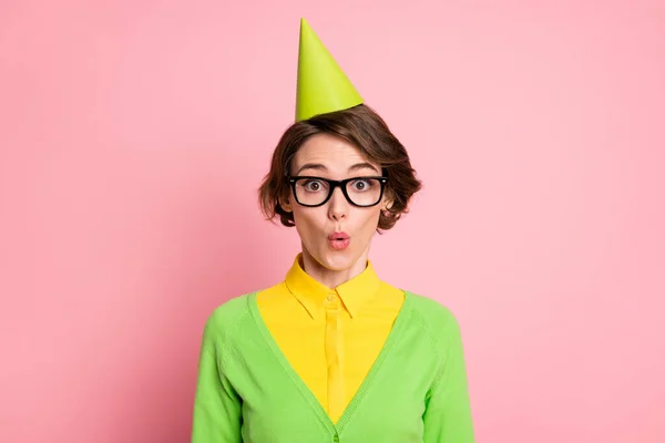 Photo of astonished charming young woman wear glasses cone hat birthday discount isolated on pastel pink color background — Stock Photo, Image