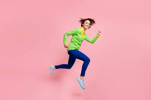 Full length profile side photo of brown bob haired woman jump air run empty space discount isolated on pink color background — 图库照片
