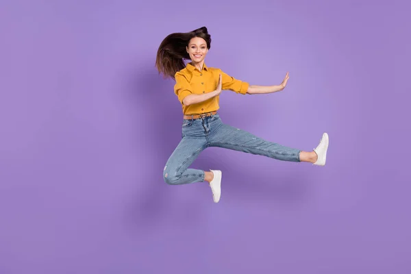 Full length body size side profile photo jumping girl practising martial arts isolated pastel purple color background — 스톡 사진