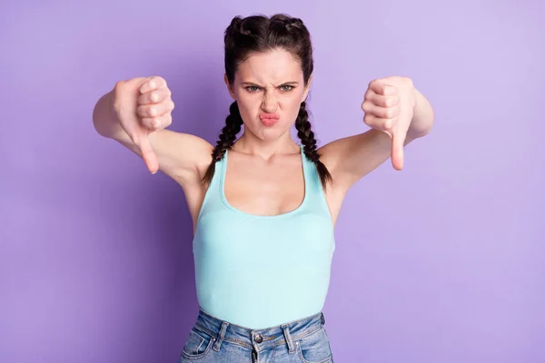 Portrait of attractive mad fury girl showing two double thumbs down isolated over violet purple color background — Photo