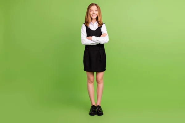 Full length body size view of pretty cheerful girl folded arms isolated over bright green color background — 스톡 사진