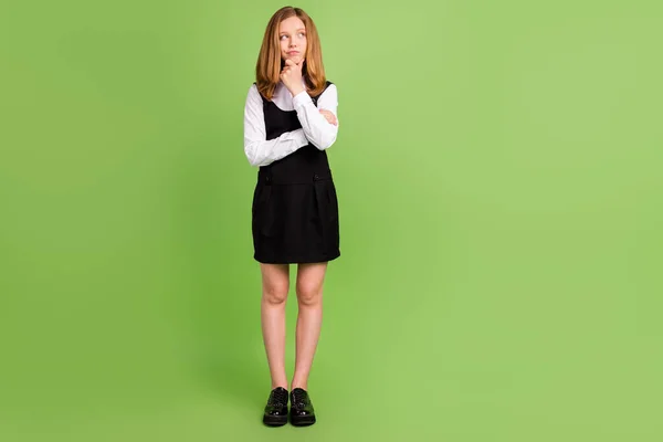 Full length body size view of attractive minded girl overthinking copy space isolated over green color background — 스톡 사진