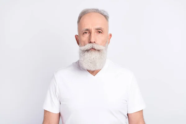 Photo of serious old calm man wear white t-shirt beard casual clothes isolated on grey color background — Stock Photo, Image