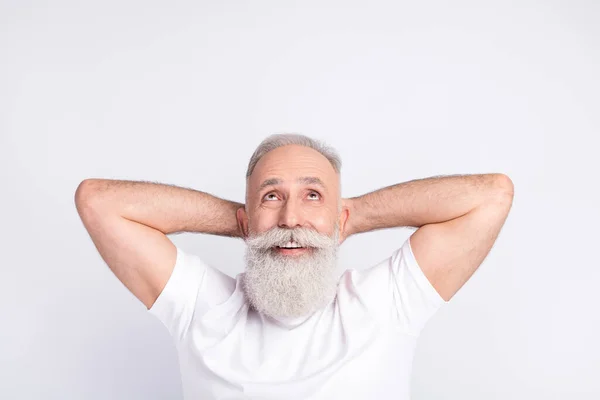 Top above high angle view photo of happy old man look up empty space relax smile isolated on grey color background — Stock Photo, Image