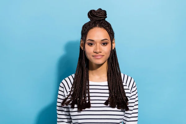 Photo portrait of smiling girl with dreadlocks wearing striped shirt isolated pastel blue color background — Foto Stock