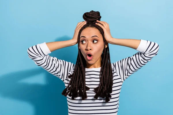 Photo of young african girl amazed shocked surprised fake news look empty space isolated over blue color background — Foto de Stock