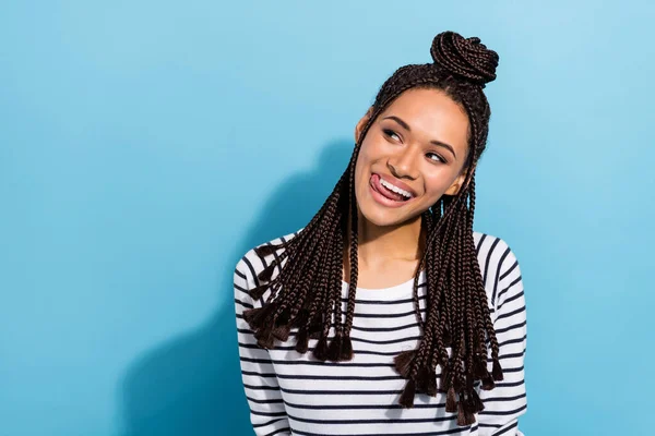 Photo of young black girl happy positive smile lick tongue lips tasty hungry look empty space isolated over blue color background — Stok fotoğraf