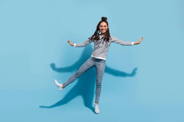 Full length photo of young excited black girl happy positive smile have fun isolated over blue color background — Foto de Stock