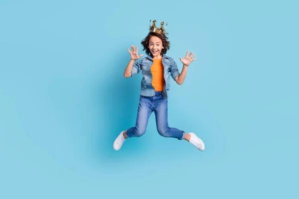 Full body photo of young boy prince happy positvie smile jump up have fun isolated over blue color background — ストック写真