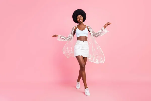 Full size photo of impressed short hairdo millennial lady wear white top cape skirt isolated on pastel pink color background —  Fotos de Stock