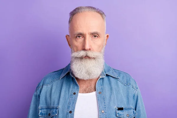 Photo of thoughtful serious age gentleman wear jeans shirt isolated violet color background — Φωτογραφία Αρχείου