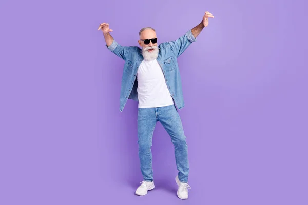 Full body photo of aged man happy positive smile have fun dance party isolated over violet color background — Photo