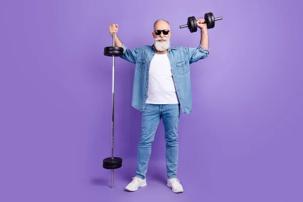 Full body photo of aged man sporty happy positive smile training arms muscles barbell isolated over purple color background — Photo