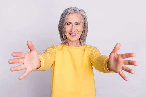 Photo of happy excited cheerful lovely grandmother with open hands invite you in hug isolated on grey color background — Stock Fotó