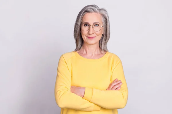 Photo of happy good mod beautiful mature businesswoman with folded hands wear glasses isolated on grey color background — Fotografia de Stock