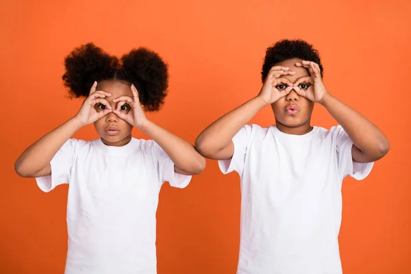 stock image Photo of small funky girl boy hands eyewear wear white t-shirt isolated on orange color background