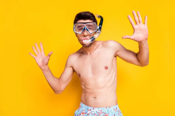 Photo of charming impressed young man naked torso wear goggles breathing tube smiling isolated yellow color background — Stock Photo, Image