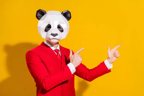 Photo de gars fiable doigt direct espace vide usure tête de panda costume rouge cravate isolé sur fond de couleur jaune — Photo