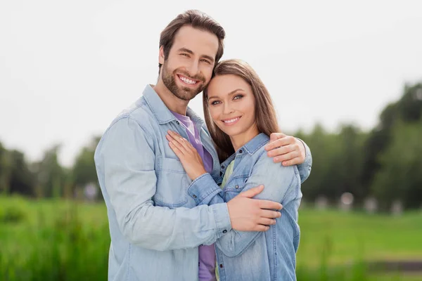 Photo of lovely cute smiling good mood charming couple boyfriend girlfriend hug embrace each other spend free time outside — Stock Photo, Image