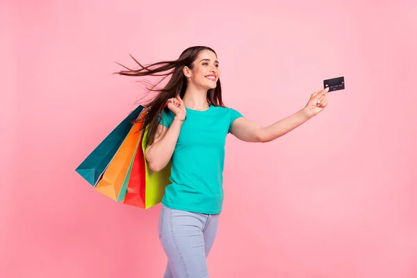 Profile side photo of young woman happy positive smile shop pay credit card bags isolated over pastel color background — Stock Photo, Image