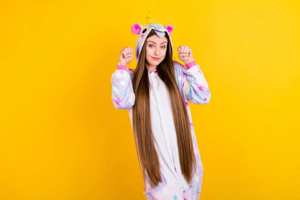 Portrait of pretty cheerful comic girl posing having fun wear animal look fooling isolated over bright yellow color background — Stock Photo, Image