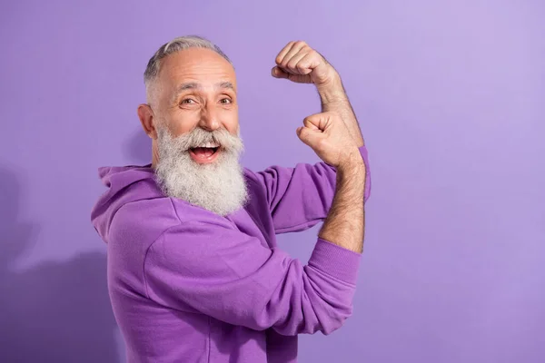 Profile side view portrait of attractive lucky cheerful grey-haired man celebrating great attainment isolated over purple violet color background — Stock Photo, Image