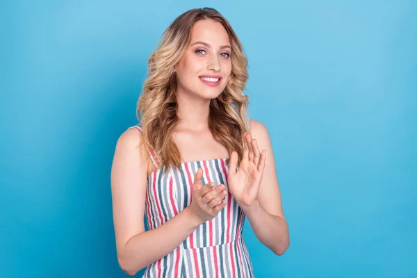 Photo of young woman happy positive smile clapping hands congrats victory isolated over blue color background — Stock Photo, Image