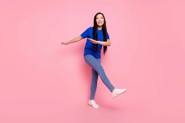 Full body photo of cheerful pretty young woman dance good mood weekend isolated on pink color background — Stock Photo, Image