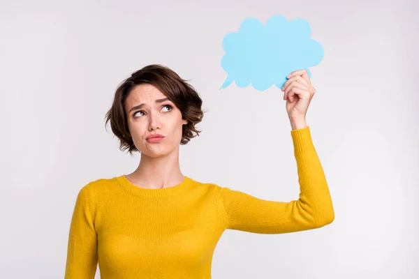 Photo of uncertain troubled girl hold mind cloud look up empty space wear yellow shirt isolated grey color background — Stock Photo, Image