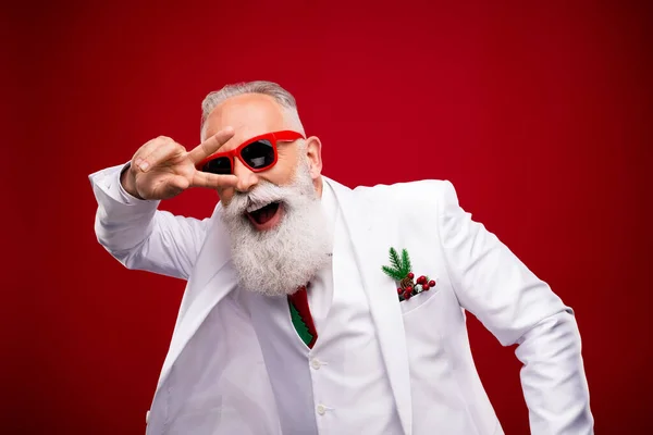 Photo of cool aged white hair man show v-sign wear eyewear white jacket isolated on red color background — Stock Photo, Image