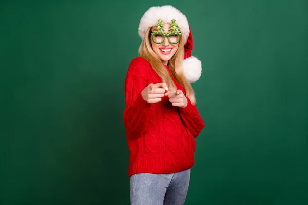 Photo of positive pretty cheerful young woman point finger you choose cool isolated on green color background — Stock Photo, Image