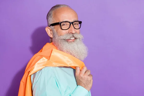 Photo of old charming smart cool man wear glasses smile hold blazer isolated on purple color background — Stock Photo, Image