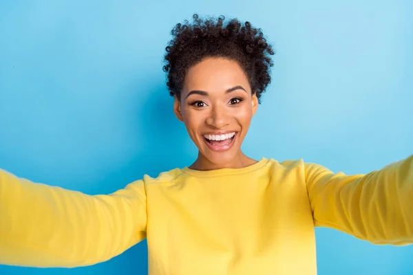 Photo portrait young girl smiling overjoyed taking selfie isolated pastel blue color background — ストック写真