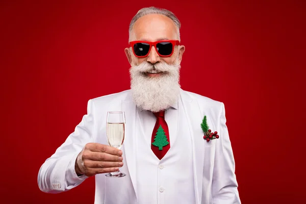 Photo of nice aged white hair man hold champagne wear eyewear white jacket isolated on red color background — Stock Photo, Image