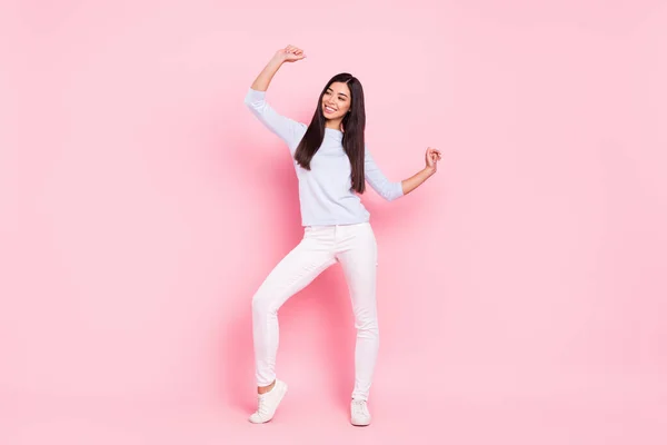 Full length body size of cheerful woman dancing at party looking copyspace isolated on pastel pink color background — Stock Photo, Image