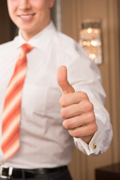 Successful businessman. Cropped image of cheerful young man in formalwear gesturing and smiling — Stock Photo, Image