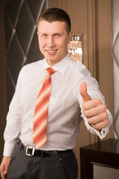 Successful businessman. Cropped image of cheerful young man in formalwear gesturing and smiling — Stock Photo, Image