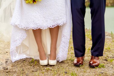 Legs loving couples. man and woman. beautiful shoes clipart