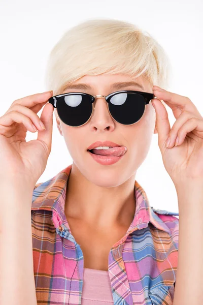 Beautiful young blond hair women adjusting her glasses and licks — Stock Photo, Image