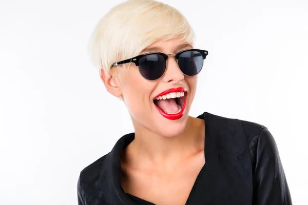 Successful beautiful young woman with red lips adjusting her glasses — Stockfoto