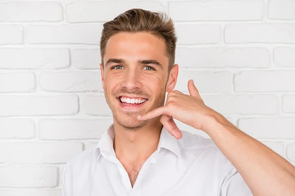 Call me. Man  gesturing mobile phone near his face — Stock Photo, Image