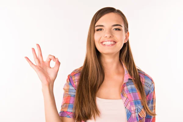 Girl showing ok and smiling — Stock Photo, Image